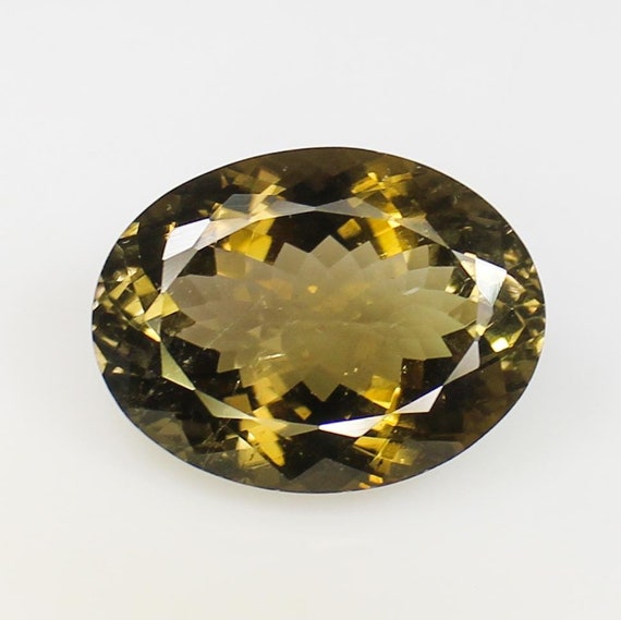 Oval Greenish Yellow Tourmaline Gemstone: Natural Bio Color, 32.40 CTS