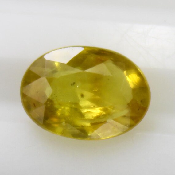 Natural Faceted Yellow Sapphire Piece In Oval Shape 1.10 Carats 7x5x3 mm Size