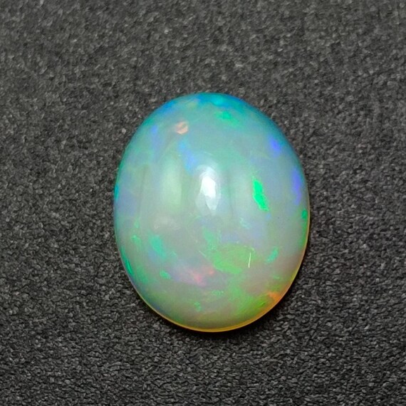 Natural Opal Cabochon: Natural Oval Multi-Fire Gemstone, 2.30 CTS (11X9X5 MM)