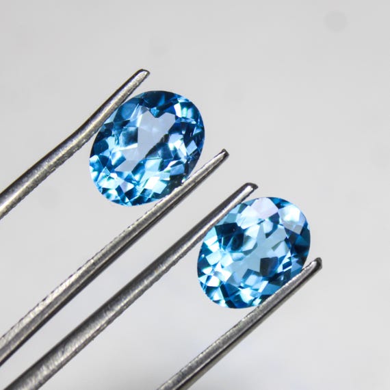 Natural Swiss Blue Topaz Gemstone Pair: Oval Cut, 4.00 Carat