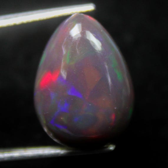 Natural Black Ethiopian Opal Cabochon: Pear Shape Gemstone (17x13x6 MM, 5.80 Carat)