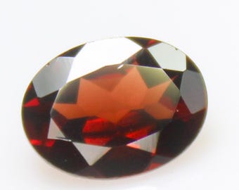 Faceted Red Mozambique Garnet: Oval Gemstone, 1.30 Carats