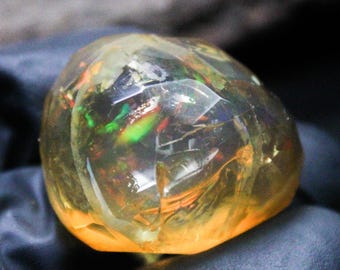 Ethiopian Opal Specimen: Faceted Raw Multi Fire Opal (28x23x17 MM, 63.15 Carats