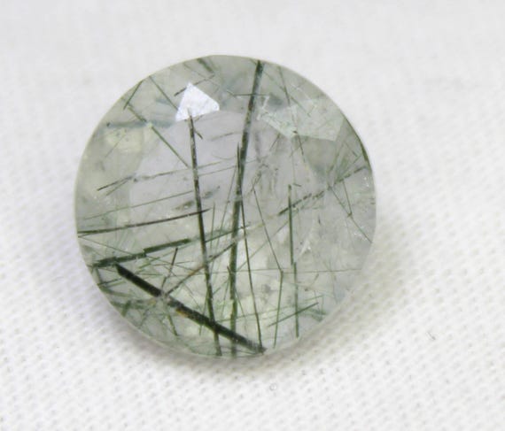 Faceted Black Rutile Quartz: 5.50 Carat Round Gemstone, 12x12x7 mm