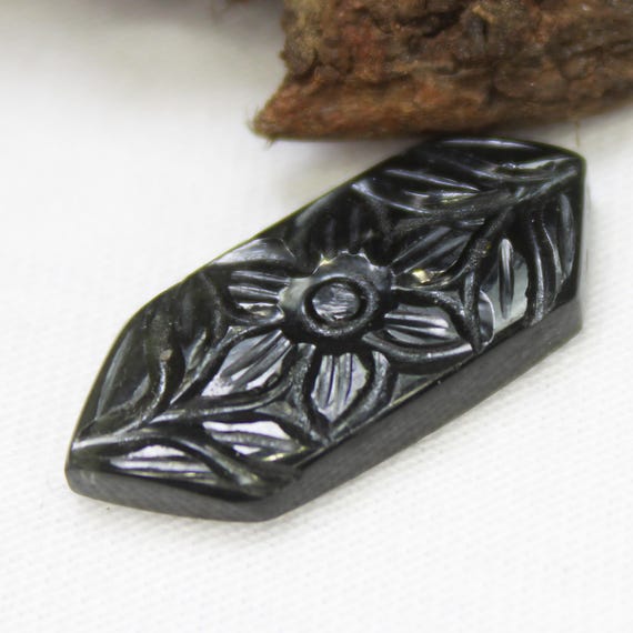 Dark Green Tourmaline Carving: 6.70 Carats, 21x9x3 mm Fancy Gemstone