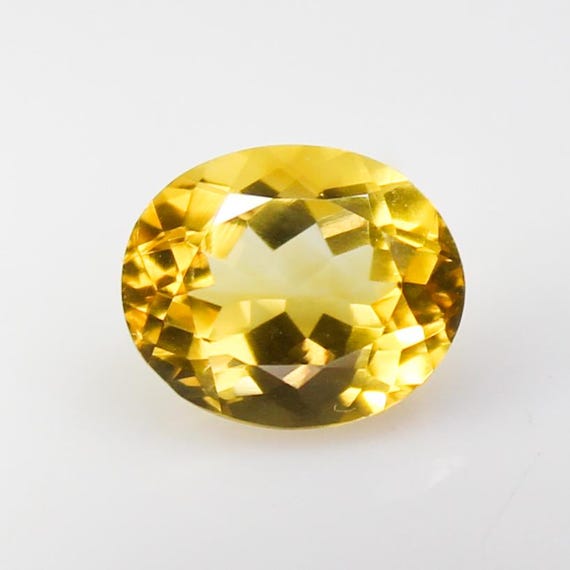 Faceted Yellow Citrine: Natural Oval Gemstone from Brazil (4.65 Carats)