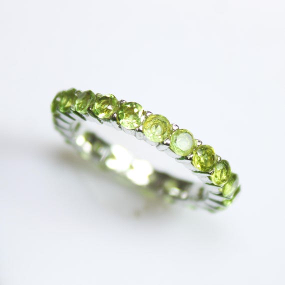 Natural Green Peridot Ring: Sterling Silver Band with Cubic Zirconia