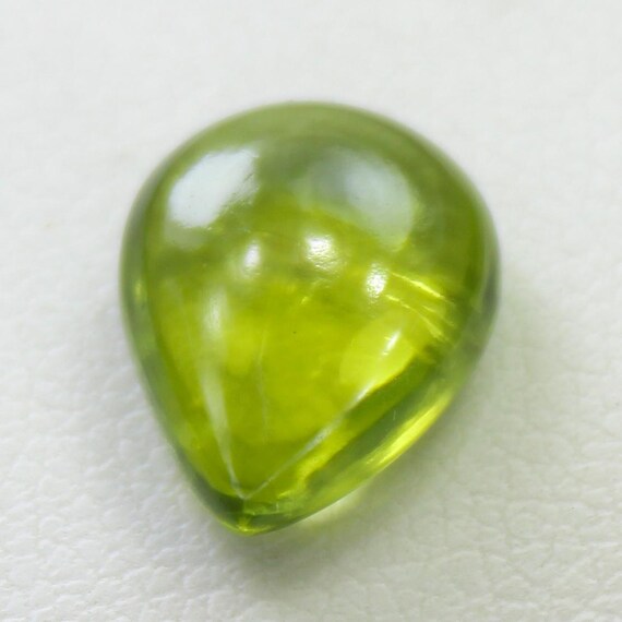 Natural Green Peridot Cabochon: 3.70 Carat Pear-Shape Gemstone 11x9x4 mm Size