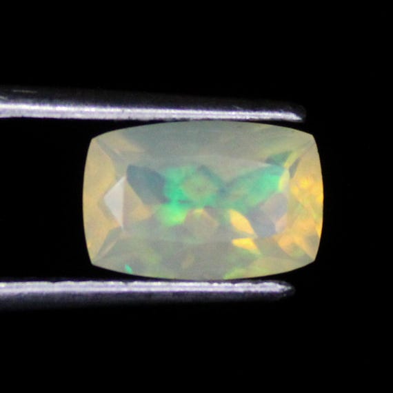 Faceted Ethiopian Opal: 2.00 Carat Cushion Cut Gemstone