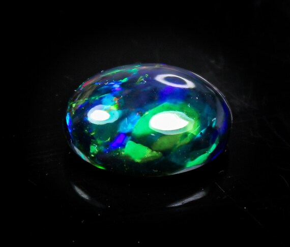 Oval Ethiopian Black Opal Cabochon Stone: Natural Green Fire, 6.30 Cts (15x11x7 MM)
