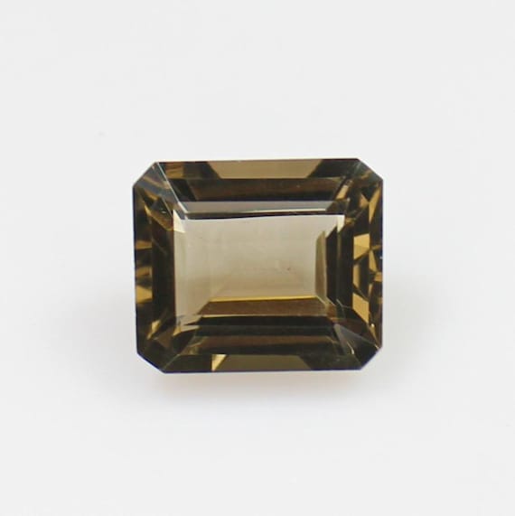 Natural 11X9X6mm Smoky Quartz. Emerald Cut Shape, Weight - 4.20 Carats.