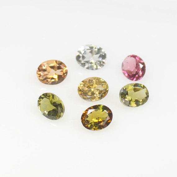 Multi Tourmaline Gemstone Lot: 7 Oval Faceted Stones, 2.35 CTS
