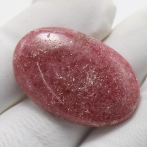Natural Rhodonite Cabochon: AAA+ Oval Gemstone, 45.40 Carat 32x21x6 mm Size