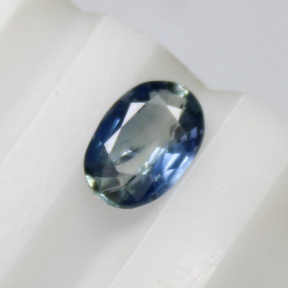 Natural Faceted Blue Sapphire Piece In Oval Shape 0.75 Carats 7x5x2 mm Size