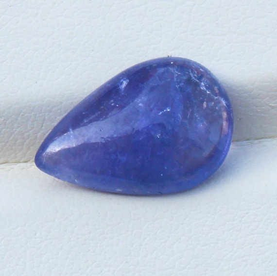 Natural Blue Tanzanite Cabochon: 6.65 Carat In Pear Shape Gemstone, 16x11x5 mm
