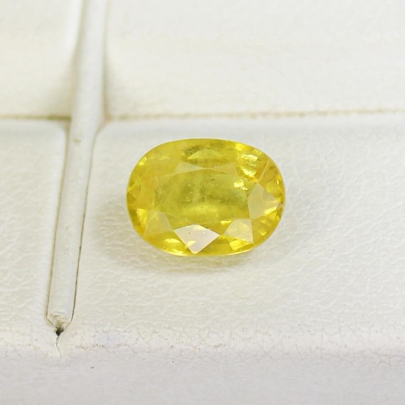 Natural Yellow Sapphire: Faceted Oval Gemstone, 1.75 Carats