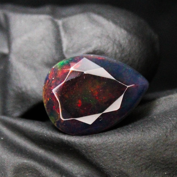 Faceted Black Opal Pear Cabochon: Natural Red Fire, 4.15 Carat