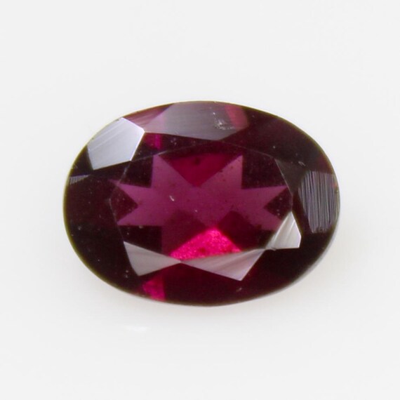 Faceted Red Rhodolite Garnet In Oval Shape: (1.20 Carat - 8x6x3 MM Size)