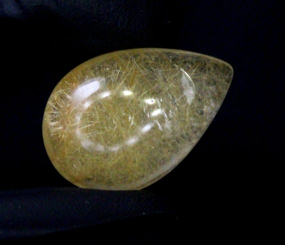 Golden Rutile Quartz Cabochon: Pear Shape, 22 Carats