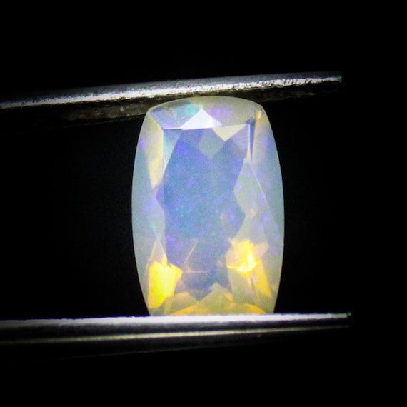 Faceted Ethiopian Opal: 1.45 Carat Cushion Cut Gemstone