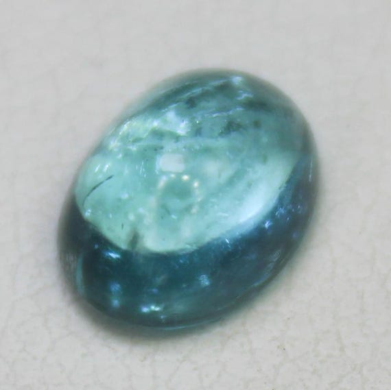 Natural Blue Apatite Cabochon: 1.60 Carat In Oval Shape Gemstone, 8x6x4 mm