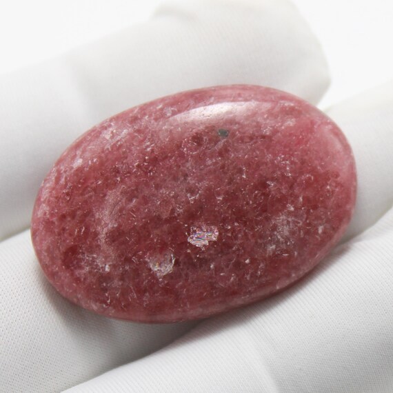 Natural Rhodonite Cabochon: AAA+ Oval Gemstone, 63.00 Carat 35x23x7 mm Size