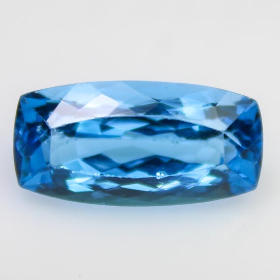 Natural Swiss Blue Topaz Faceted: 11.20 Carat Cushion Shape Cut Gemstone, 18x9x7 mm