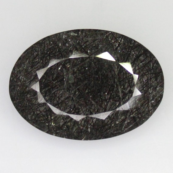 Natural Faceted Black Rutile Quartz: Oval Shape Gemstone (14.20 Carats, 20x15x8 mm)