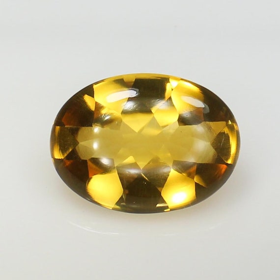 Faceted Yellow Citrine Gemstone: Oval, 16.00 Carats
