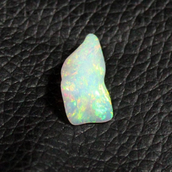 Natural White Fire Ethiopian Opal Polished Tumble For Jewelry Making And Collection 1.75 Carats Piece 15x8x5 mm Size In AAA+ Quality