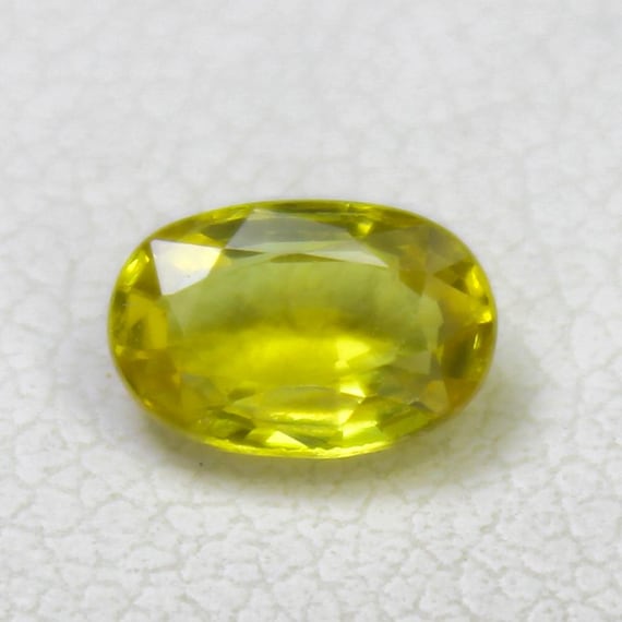 Natural Faceted Yellow Sapphire Piece In Oval Shape 0.60 Carats 6x4x2.5 mm Size