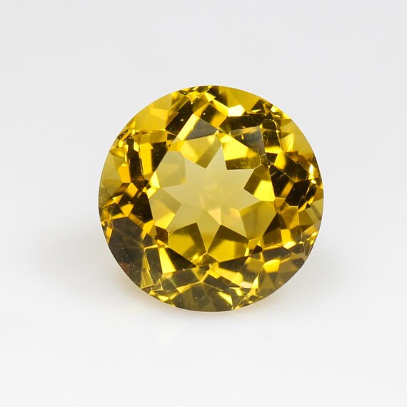 Natural Faceted Yellow Citrine: 22.80 Carat Round Gemstone (18x12 mm)