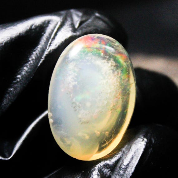 Ethiopian Opal Cabochon: Multi Fire Oval Gemstone (22.5x16x9 MM, 20.25 Carats)