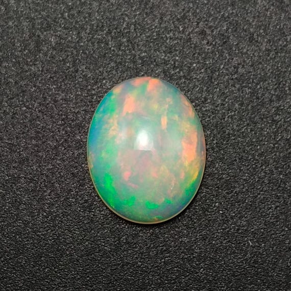 Natural Opal Cabochon: Natural Oval Multi-Fire Gemstone, 3.10 CTS (12x10x5 MM)