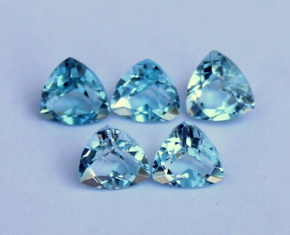 Natural Sky Blue Topaz Faceted 5 Pieces Lot: Trillion Faceted Gemstones, 3.00 Carats