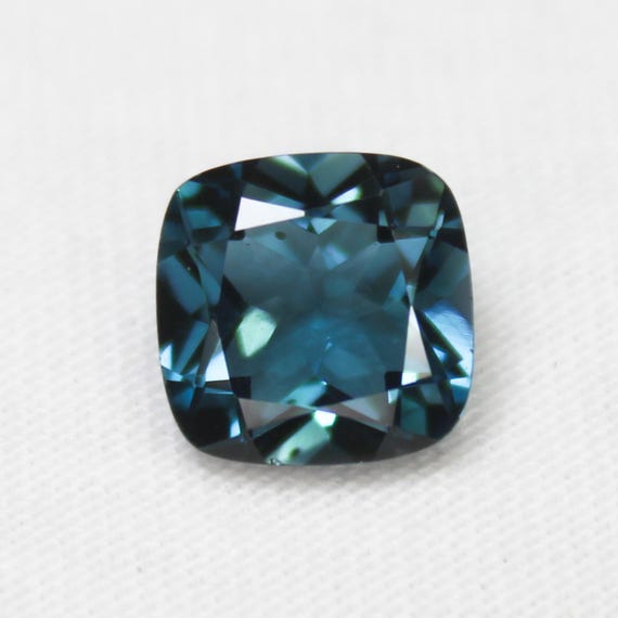 Faceted London Blue Topaz: 3.22 Carat Cushion Cut Gemstone, 9x9x5 mm