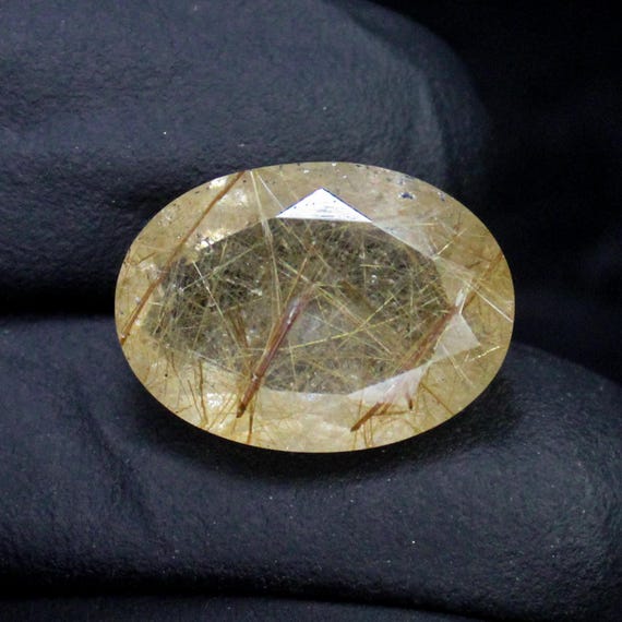 Faceted Golden Rutile Quartz: Oval Gemstone, 11.30 Carats
