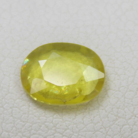 Natural Faceted Yellow Sapphire Piece In Oval Shape 0.85 Carats 7x5.5x2 mm Size
