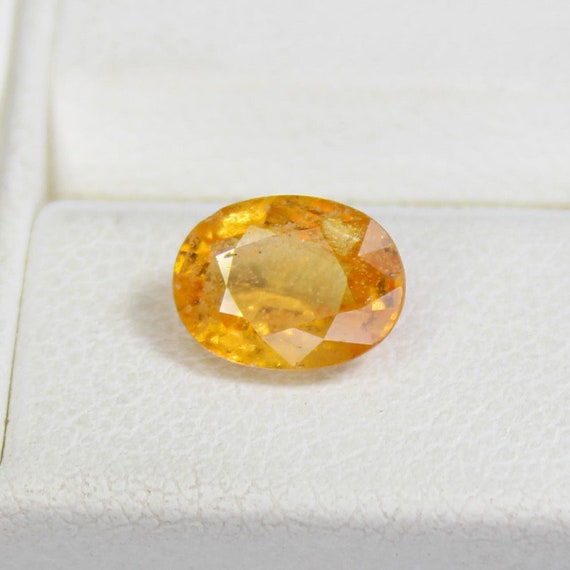 Faceted Orange Sapphire: Natural Oval Gemstone, 1.35 Carats