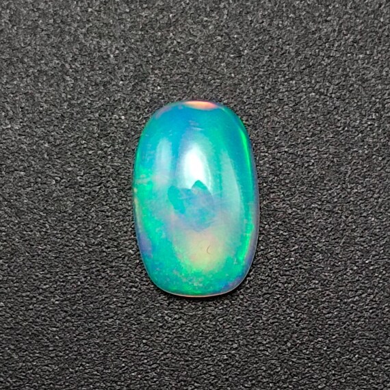 Natural Opal Cabochon: Natural Oval Multi-Fire Gemstone, 1.10 CTS (10X6X3 MM)