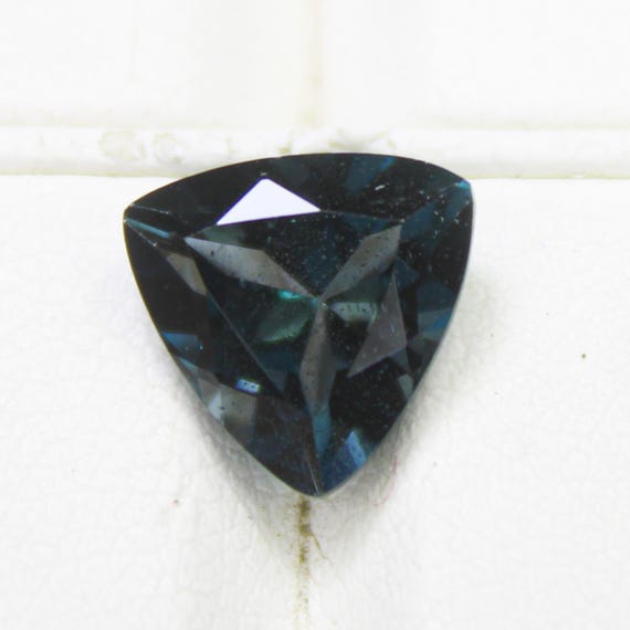 Natural London Blue Topaz Gemstone: 2.80 Carat Trillion, 9x9x5 mm