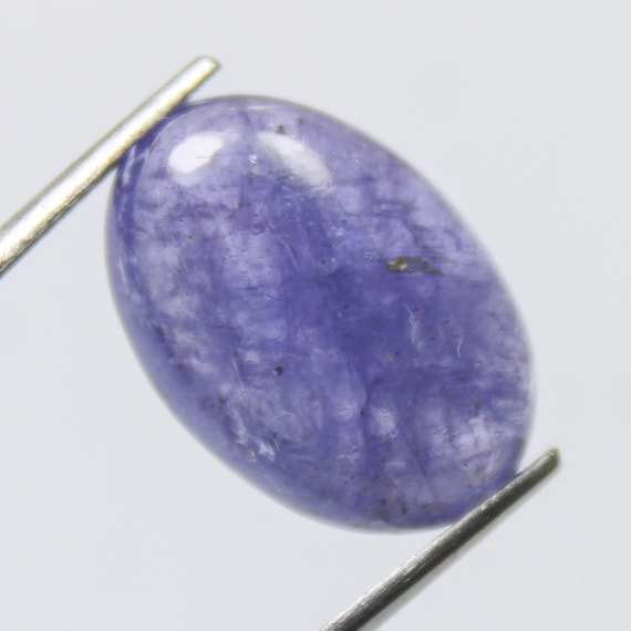 Natural Tanzanite Oval Cabochon: Purplish Blue Gemstone, 9.35 Carat
