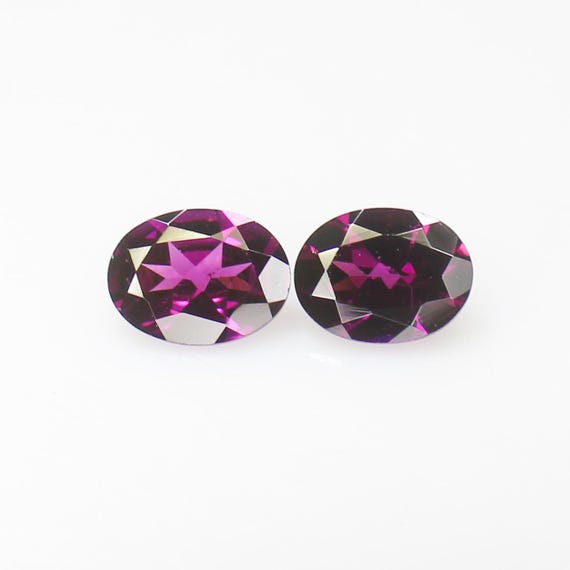 Faceted Rhodolite Garnet Pair: Oval Cut Pink Gemstones, 2.90 Carats