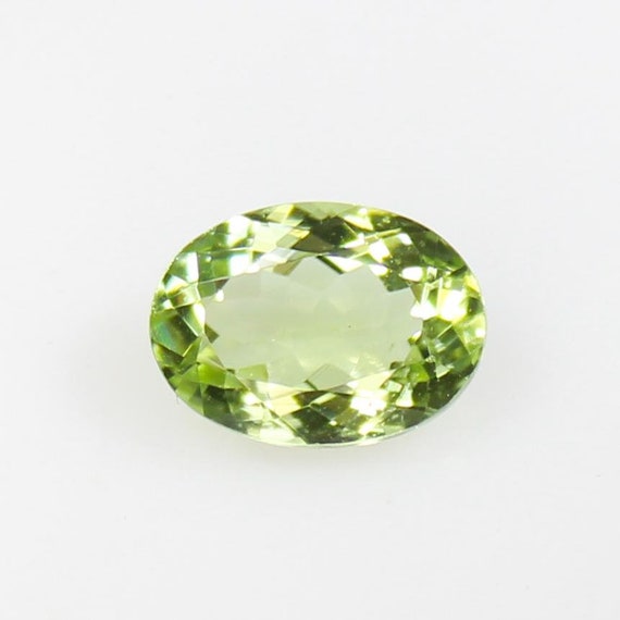 AAA+ Green Tourmaline Gemstone: Oval Faceted Gem (9X6X4 MM, 1.70 CTS)
