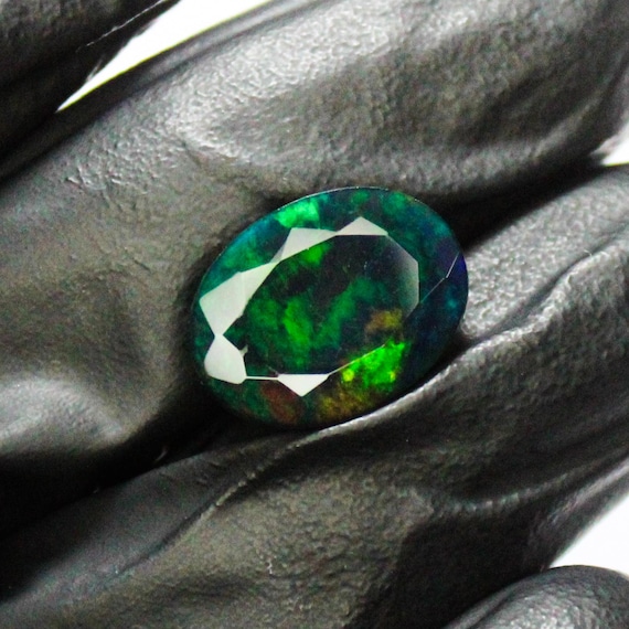 Faceted Black Opal: Oval Green Fire Gemstone, 4.00 Carats
