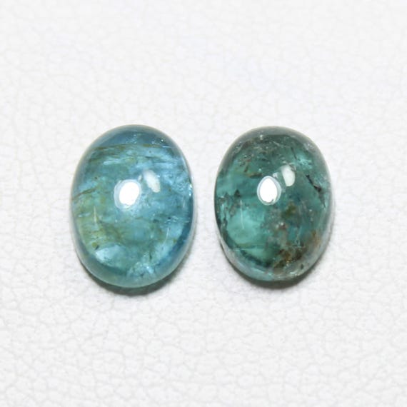 Blue Tourmaline Cabochon Pair: 2.20 Carats, 7x5 mm Oval Gemstones