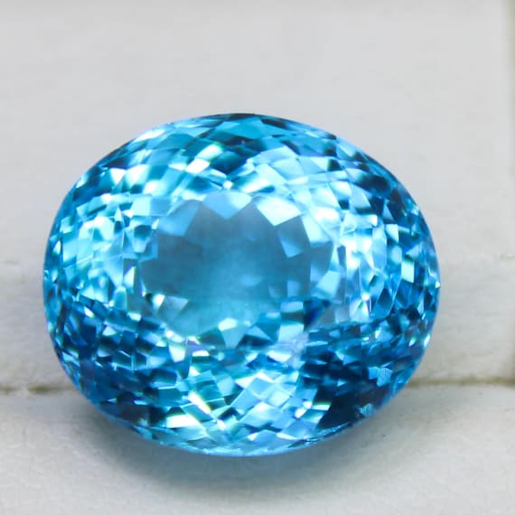 Natural Swiss Blue Topaz Faceted: 11.50 Carat Oval Shape Cut Gemstone, 13x11.5x9 mm