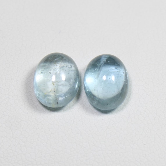 Natural Blue Aquamarine Cabochon Pair: Oval Gemstone (6.30 Ct, 10x8x5 MM)