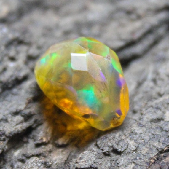 Faceted Ethiopian Opal Specimen: Raw Multi Fire Opal (14x11x8 MM, 6.75 Carats)