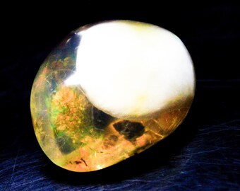 Natural Ethiopian Opal Polished Raw Specimen: Multi-Fire Gemstone (37x32x20 MM, 111.70 Carats)